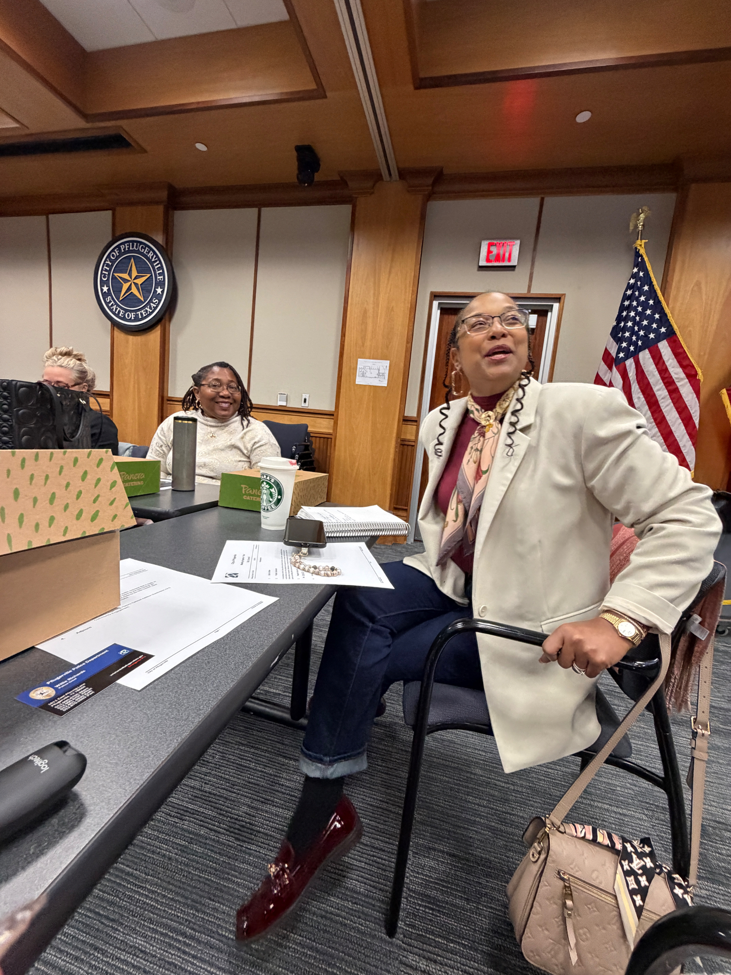 Community leader speaking at a Pflugerville civic engagement meeting