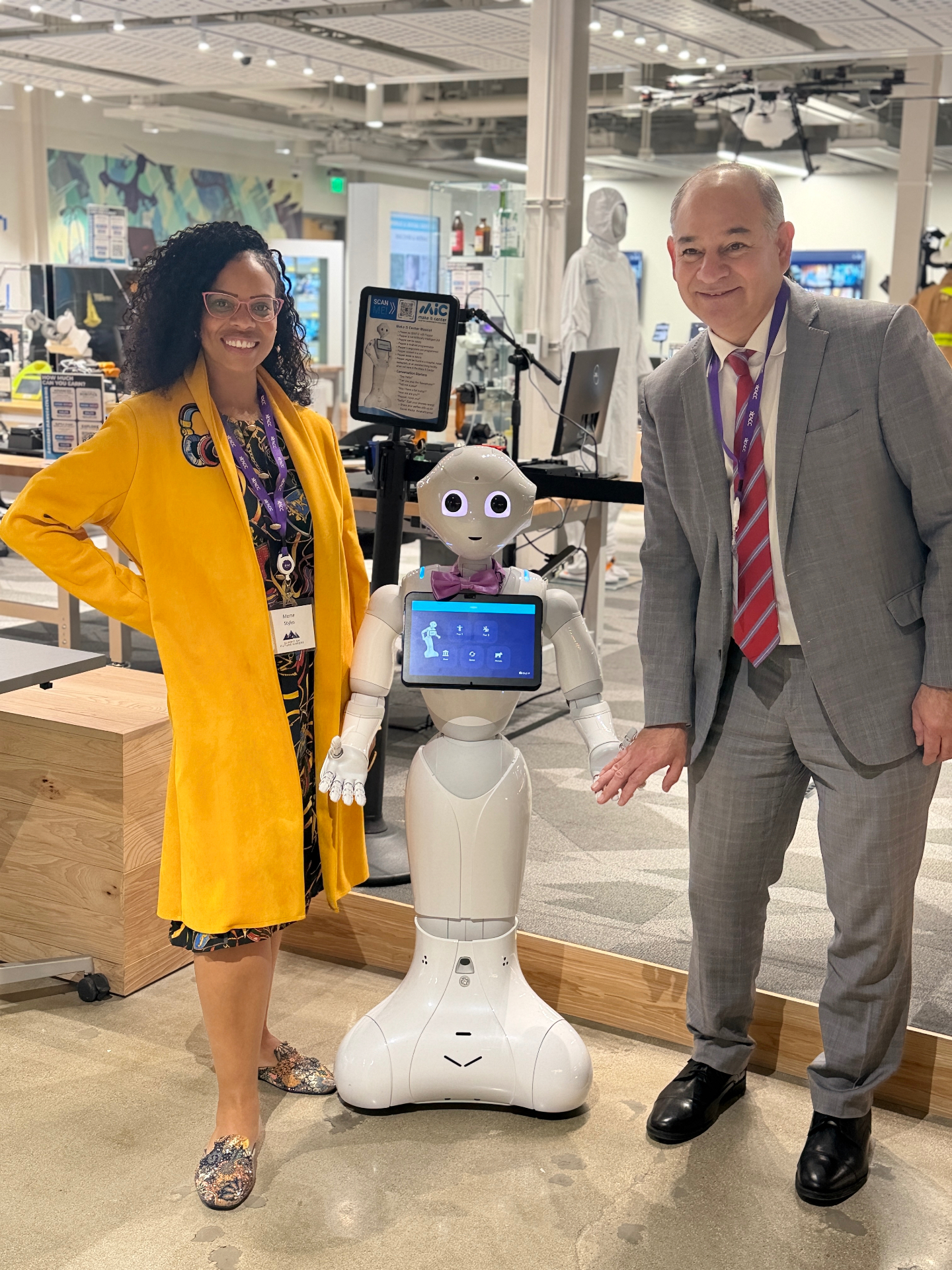 Measure leader with a humanoid robot at an innovation center